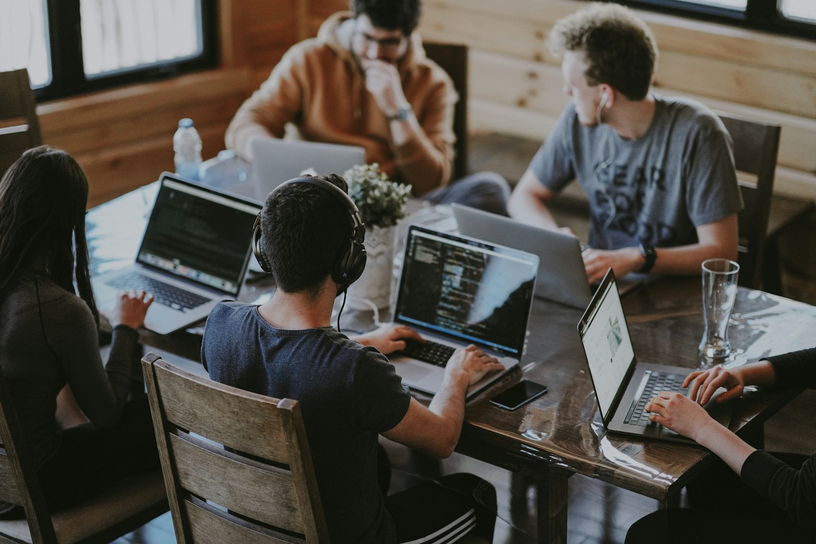 Growing team collaborating across a modern Dubai office workspace